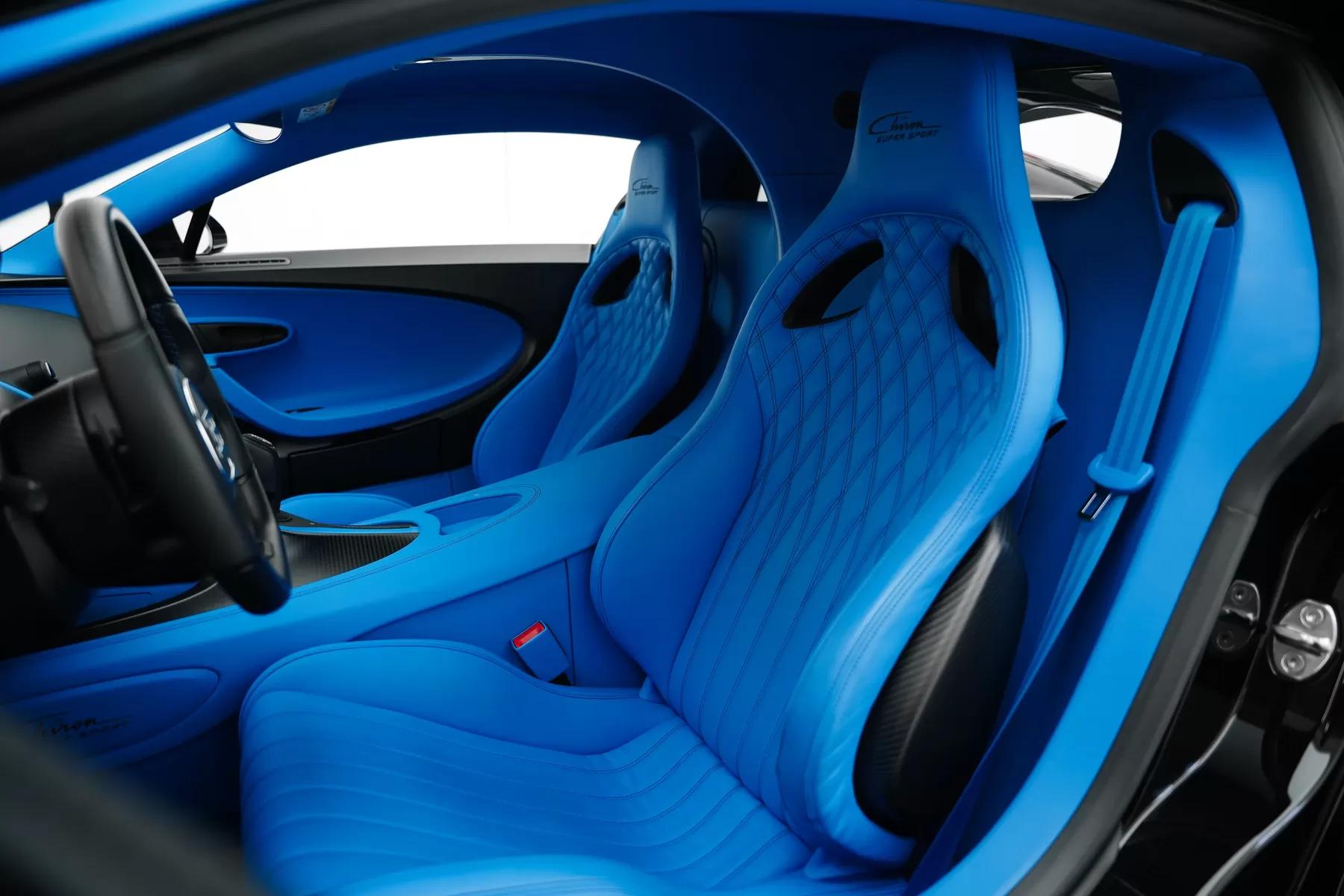Bugatti Chiron Supersport interior detail, near-black background.