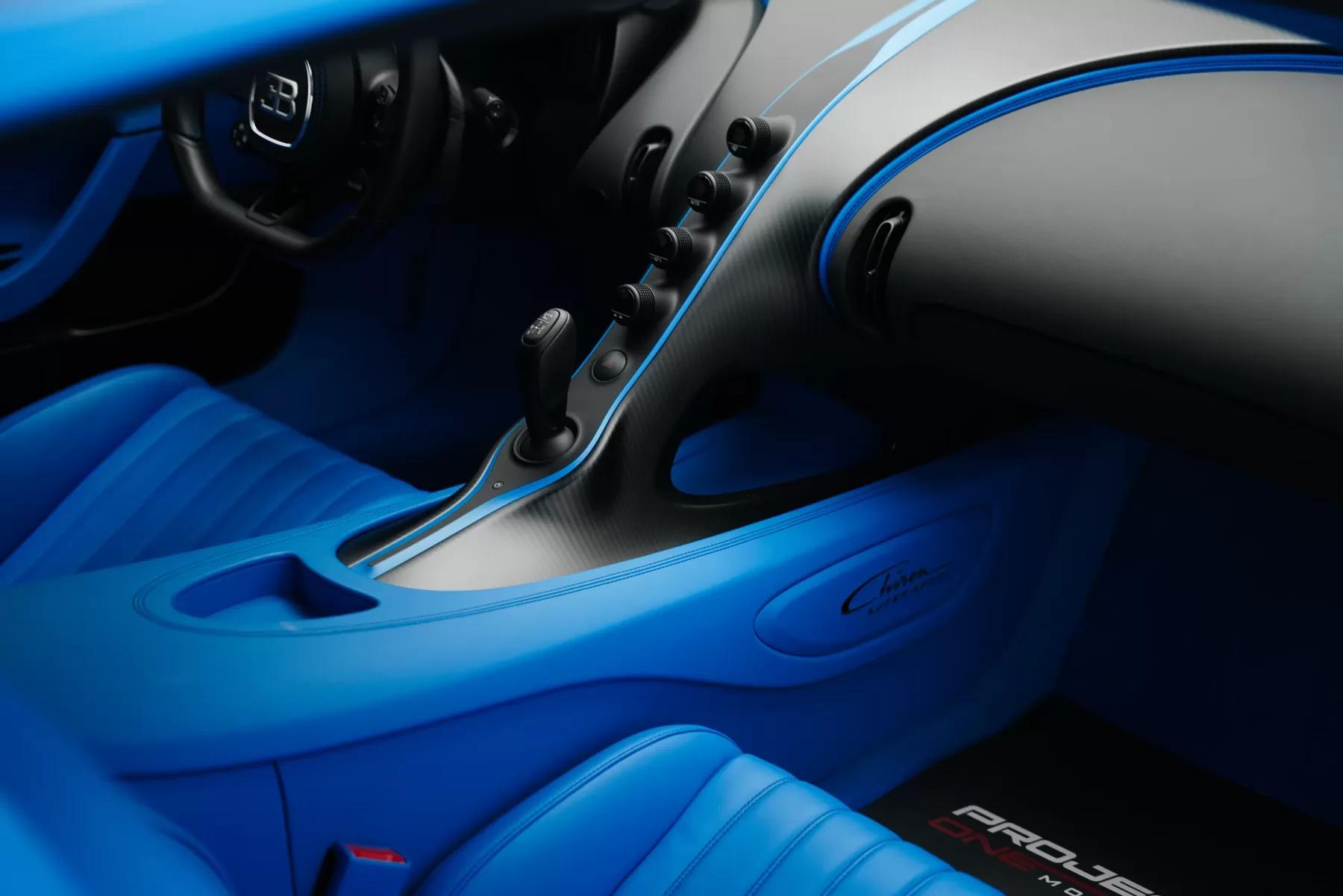 Bugatti Chiron Supersport three-quarter, held against black.
